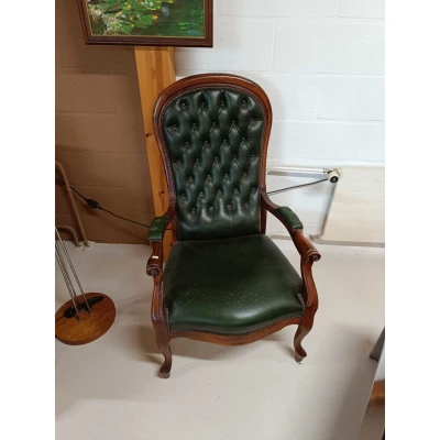 Fauteuil vintage en cuir ancien